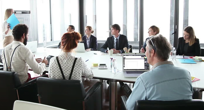 Los Angeles Intellectual Property attorneys sitting around a conference table in a meeting