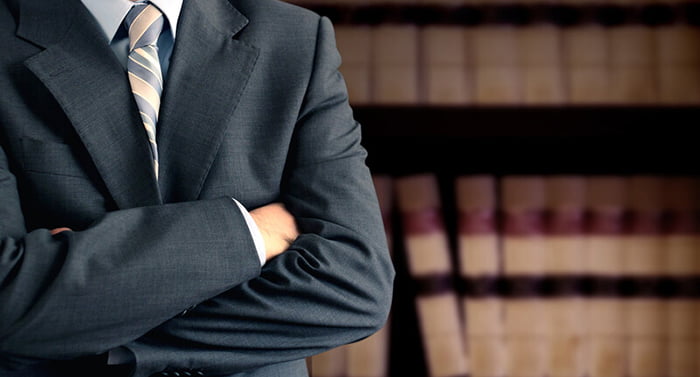 Los Angeles Business Litigation attorneys sitting around a conference table in a meeting